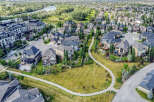 Experience luxury living in this stunning aerial view of a modern residential community.