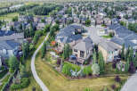 Experience luxury living in this stunning aerial view of a suburban neighborhood.