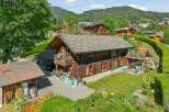 Experience the charm of this rustic wooden chalet nestled in a picturesque mountain village.