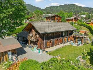 Experience the charm of this rustic wooden chalet nestled in a picturesque mountain village.