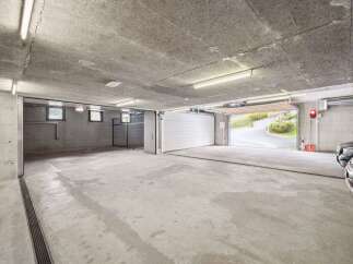 Discover this spacious underground garage, perfect for secure vehicle storage.
