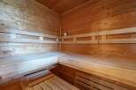 Experience ultimate relaxation in this beautifully crafted wooden sauna.