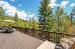 Enjoy breathtaking mountain views from this expansive deck, perfect for outdoor entertaining or quiet relaxation.