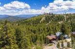 Nestled amidst a lush pine forest, this property offers breathtaking mountain views and a serene escape.