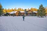 Experience the ultimate winter wonderland with this stunning property, perfectly situated amidst a serene forest landscape.