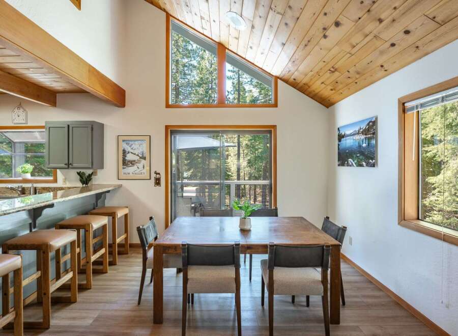 Experience the perfect blend of rustic charm and modern comfort in this inviting dining area.