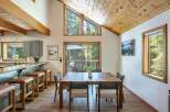 Experience the perfect blend of rustic charm and modern comfort in this inviting dining area.