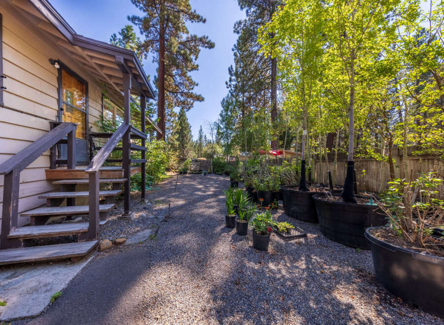 Discover this charming property featuring a welcoming porch and steps leading to the entrance.