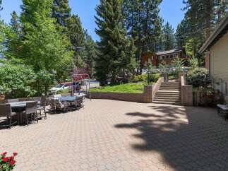 Enjoy outdoor living in this spacious paver patio, perfect for entertaining or relaxing.