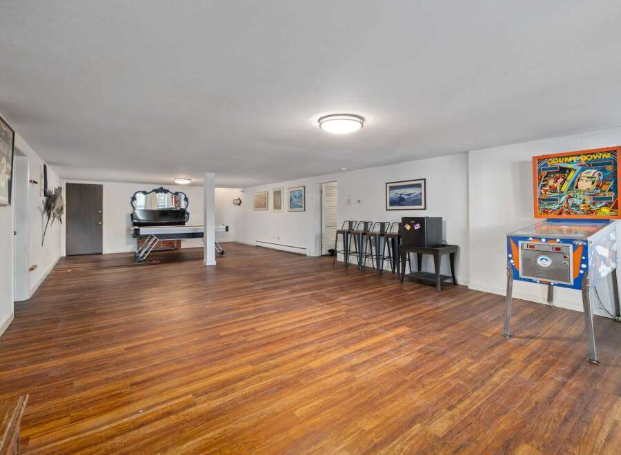 Step into this spacious basement recreation room, perfect for entertainment and relaxation.
