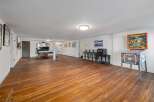 Step into this spacious basement recreation room, perfect for entertainment and relaxation.