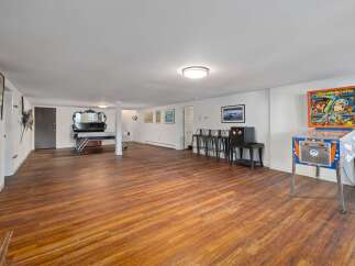 Step into this spacious basement recreation room, perfect for entertainment and relaxation.