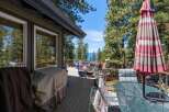 Enjoy breathtaking lake views from this stunning deck, perfect for entertaining or relaxing.