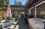 Enjoy outdoor living on this spacious deck, perfect for entertaining or relaxing.