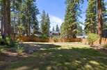 Discover this spacious backyard, perfect for outdoor living and entertaining.