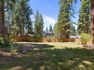 Discover this spacious backyard, perfect for outdoor living and entertaining.