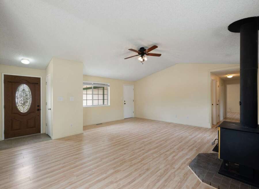 Step into this inviting living space featuring a warm and welcoming atmosphere.