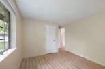 Discover this charming room featuring a large window that floods the space with natural light.
