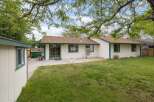 Discover this charming home with a spacious backyard, perfect for outdoor entertaining and relaxation.