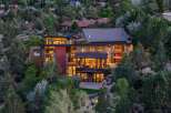 Experience modern luxury in this stunning multi-level home, nestled amidst lush greenery and offering breathtaking views.