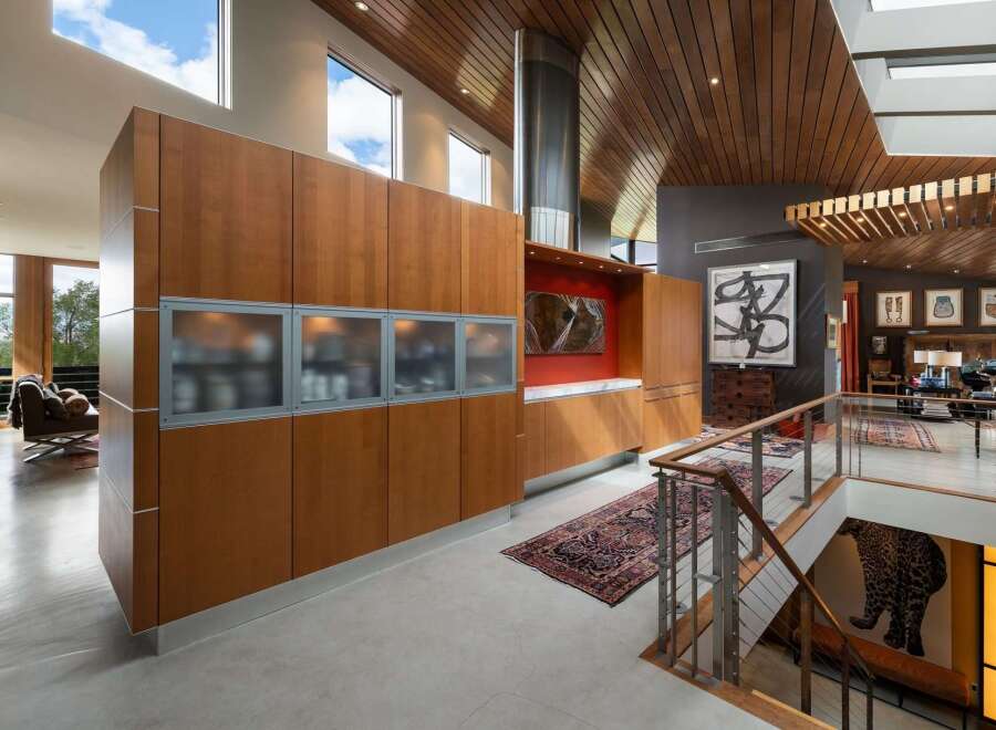 Experience modern luxury in this stunning home featuring a sleek, open-concept living space with soaring ceilings and abundant natural light.