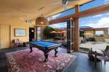 Experience ultimate relaxation and entertainment in this stunning home featuring a luxurious indoor pool area seamlessly connected to an outdoor oasis.