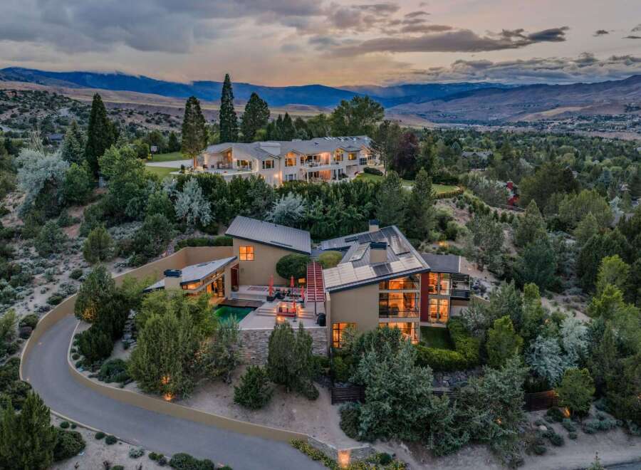 Experience luxury living in this stunning modern estate, nestled amidst rolling hills and offering breathtaking panoramic views.