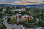 Experience luxury living in this stunning modern estate, nestled amidst rolling hills and offering breathtaking panoramic views.