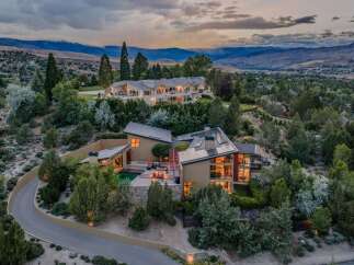 Experience luxury living in this stunning modern estate, nestled amidst rolling hills and offering breathtaking panoramic views.