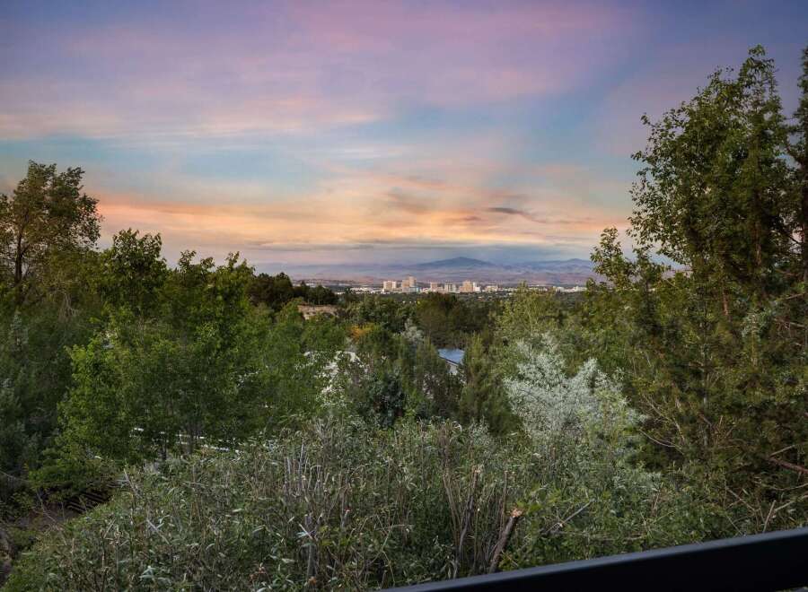Experience breathtaking panoramic views of the city skyline and distant mountains from this elevated vantage point.