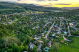Experience the charm of this picturesque mountain town nestled amidst rolling hills and lush greenery.