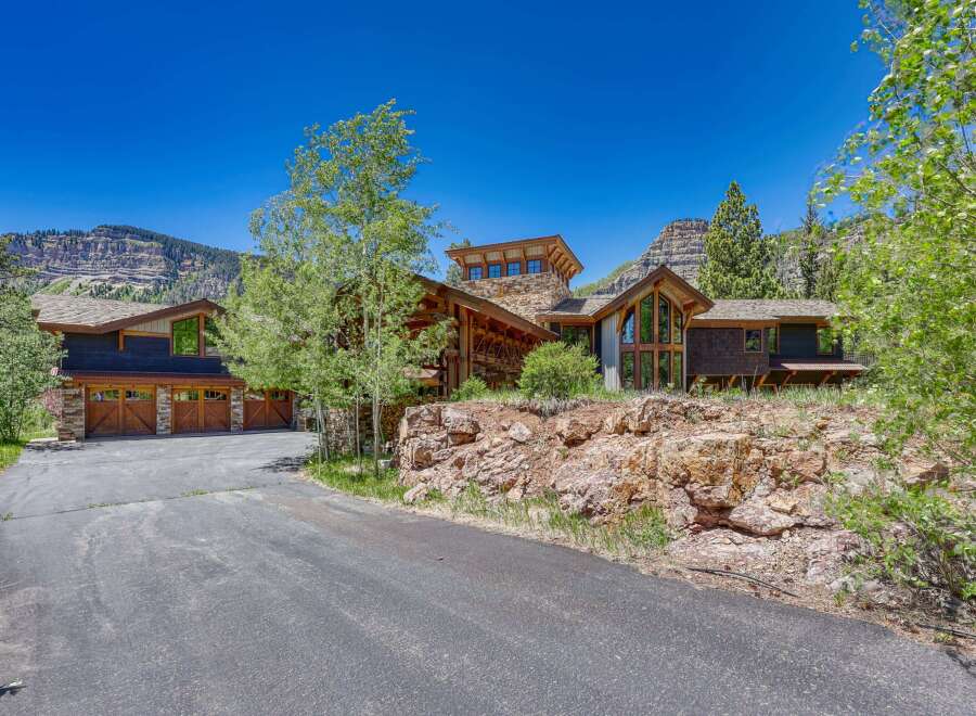 Nestled amidst stunning mountain scenery, this luxurious mountain home offers an unparalleled living experience.