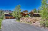 Nestled amidst stunning mountain scenery, this luxurious mountain home offers an unparalleled living experience.