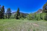 Discover this stunning property nestled amidst breathtaking mountain scenery and lush greenery.