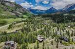 Discover unparalleled mountain living in this stunning estate nestled amidst a lush pine forest.