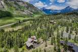 Nestled amidst a lush pine forest and rolling green hills, this stunning mountain estate offers unparalleled privacy and breathtaking natural beauty.