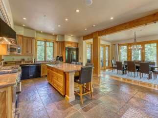 Experience luxury mountain living in this stunning kitchen and dining area.