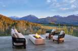 Experience luxury living with this stunning mountain view estate, featuring a modern outdoor lounge area perfect for entertaining.
