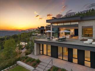 Experience luxury living in this modern architectural masterpiece, boasting expansive glass walls and multiple levels of outdoor entertaining space.