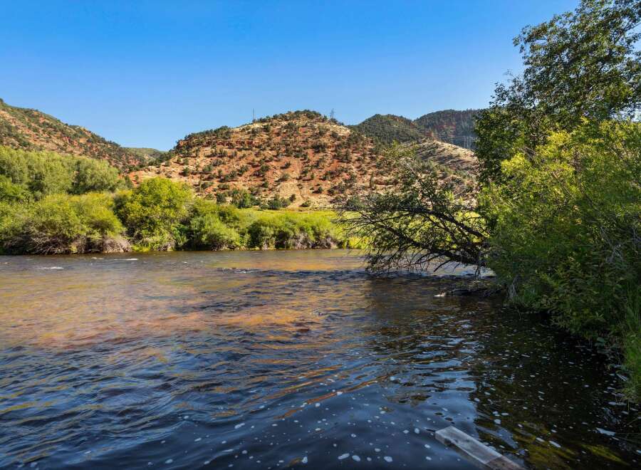 Experience the serene beauty of this riverside property, offering a tranquil escape amidst stunning natural landscapes.