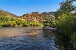 Experience the serene beauty of this riverside property, offering a tranquil escape amidst stunning natural landscapes.