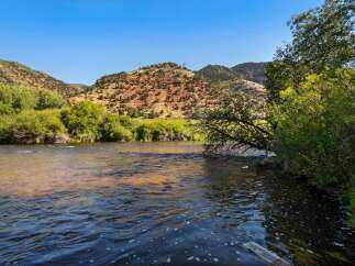 Experience the serene beauty of this riverside property, offering a tranquil escape amidst stunning natural landscapes.