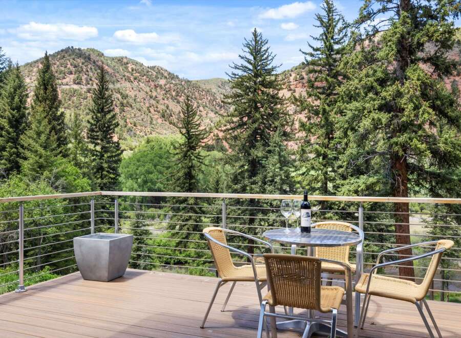 Enjoy breathtaking mountain views from this stunning deck, perfect for outdoor entertaining or quiet relaxation.