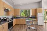 Experience the perfect blend of modern design and natural beauty in this stunning kitchen.