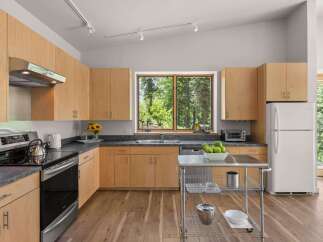 Experience the perfect blend of modern design and natural beauty in this stunning kitchen.