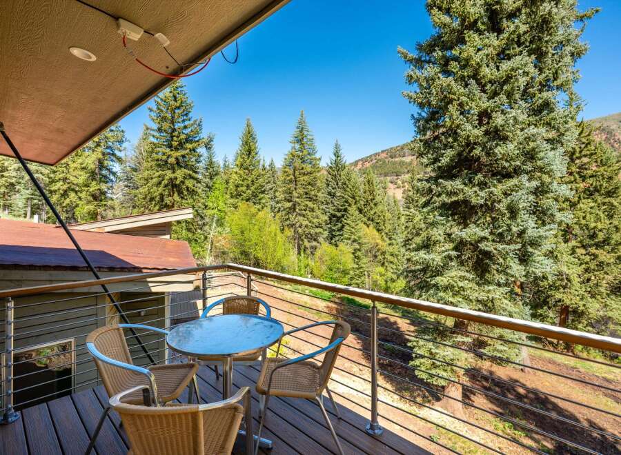 Enjoy breathtaking mountain views from this charming balcony, perfect for morning coffee or evening relaxation.