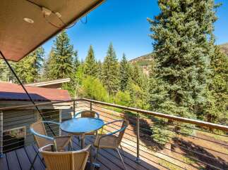 Enjoy breathtaking mountain views from this charming balcony, perfect for morning coffee or evening relaxation.