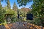Enjoy breathtaking mountain views from this expansive deck, perfect for outdoor relaxation and entertaining.