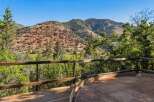 Enjoy breathtaking mountain views from this stunning property's expansive deck.