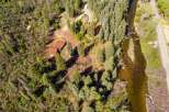 Discover this secluded mountain retreat nestled amongst towering pine trees, offering unparalleled privacy and tranquility.